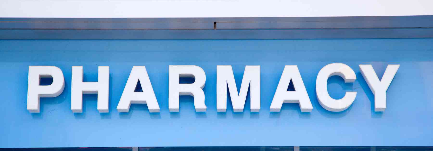 blue pharmacy sign