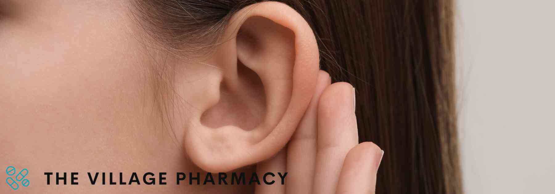 young woman holding ear