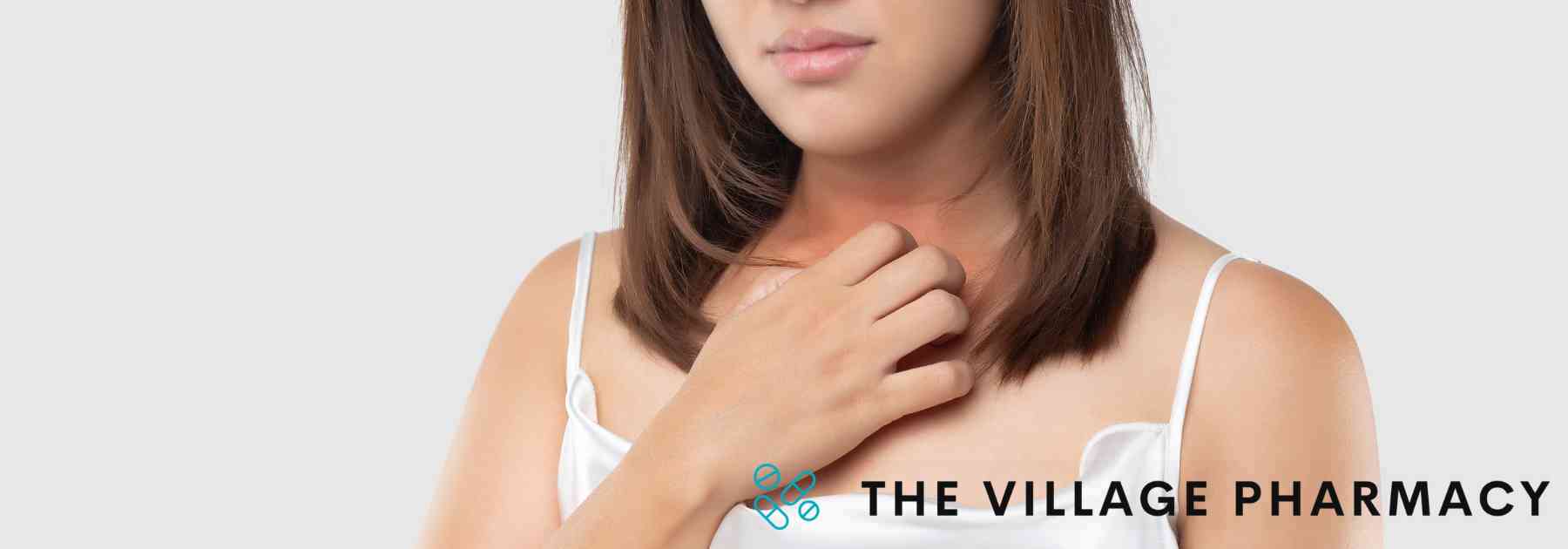woman scratching rash on her neck